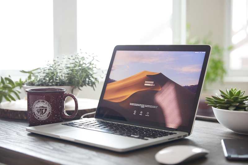 UWL mug and computer