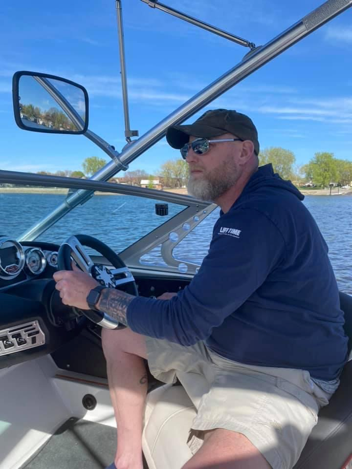 Jon Evans captaining his boat
