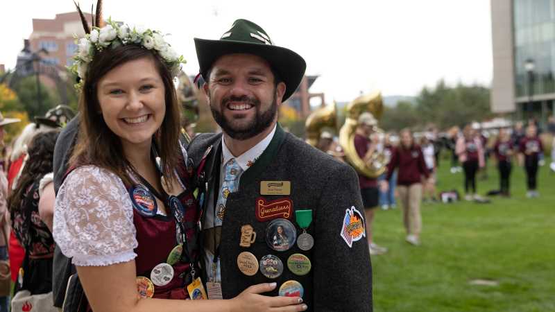 Megan and Sam Pierce enjoying the festivities at last year's UWL Child Center Oktoberfest Parade. The couple has grown to love La Crosse's annual fall festival and the meaningful connections it helps create.