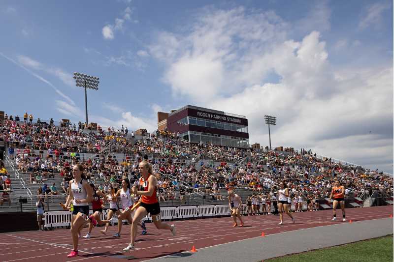 Runners on the track at the WIAA State Track & Field Meet
