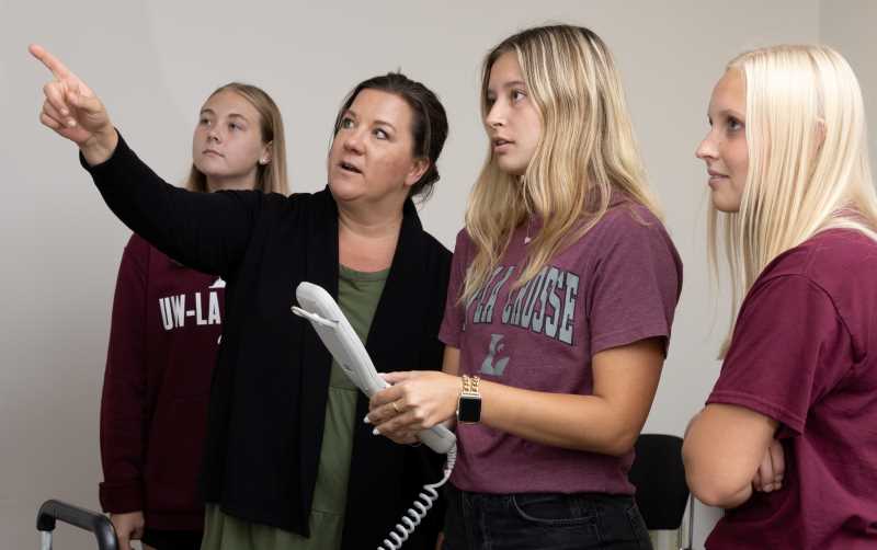 One of the fastest growing areas in Health Professions is Radiologic Sciences. From left, UWL student Ally Richarson, Director of Radiologic Sciences Melissa Weege, and UWL students Maddy Benson and Emma Strassburg are using VERT- radiation therapy virtual reality software.