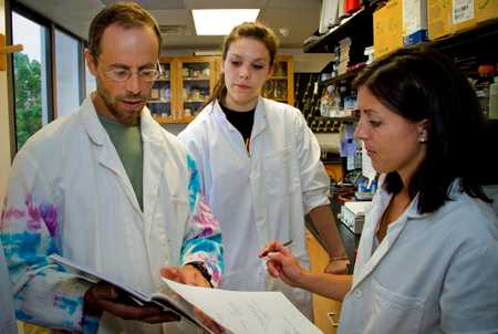 From left, Biology Professor Scott Cooper reviews data with UW-L students Jenna Kerr and Leah Morgan. Cooper is also UW-L’s director of undergraduate research, a position he started in June. A director, or central contact, was needed as more students apply for undergraduate research grants and more departments are developing undergraduate research opportunities at UW-L. Cooper’s motivation for continuing his research is his students. “I enjoy being in the lab,” he says. “As a teacher, especially at the level we teach at, it’s important to be an active in the lab.
