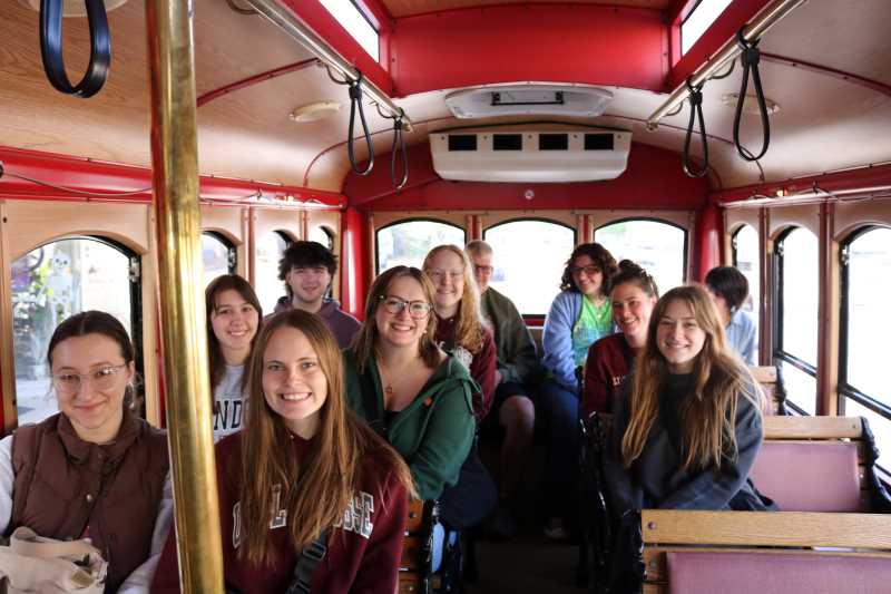 Passengers on the Mid-Century Memories Trolley Tour of Northside La Crosse heard stories about familiar icons like The Sweet Shop on Caledonia Street, going to school at Old Logan, or working at the Autolite or Rubber Mills. Photo courtesy of Explore La Crosse.