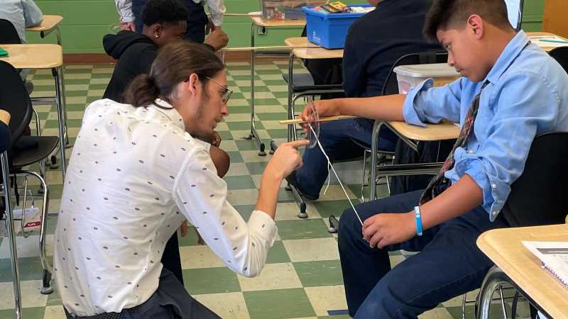 Randy Vargas, an elementary/middle education major at UWL, works with students at the Notre Dame School of Milwaukee through the summer Milwaukee Urban Experiences program.