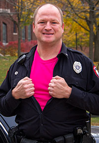 Police Officer Dave Pehl with a pink T-shirt.