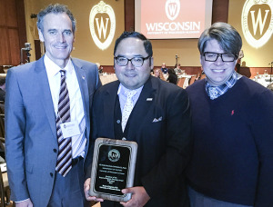 UW-L Chancellor Joe Gow; Víctor M. Macías-González and his husband, Scott Swedeen; after Macías-González received the Diversity Award Feb. 6.