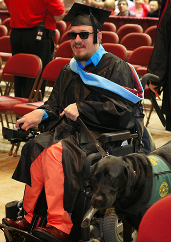 May graduate Ryan Nell at commencement. 