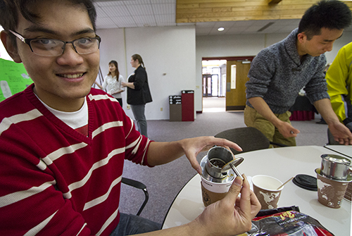 UW-L international students, from left, Dang Ton and Huyen Pham, both from Vietnam; along with Yixiang Li, from China; shared information about teas and coffee from their native countries at the Organization for Campus Women Mug and Membership event Oct. 23 in Port O' Call, Cartwright Center-Gunning Addition.