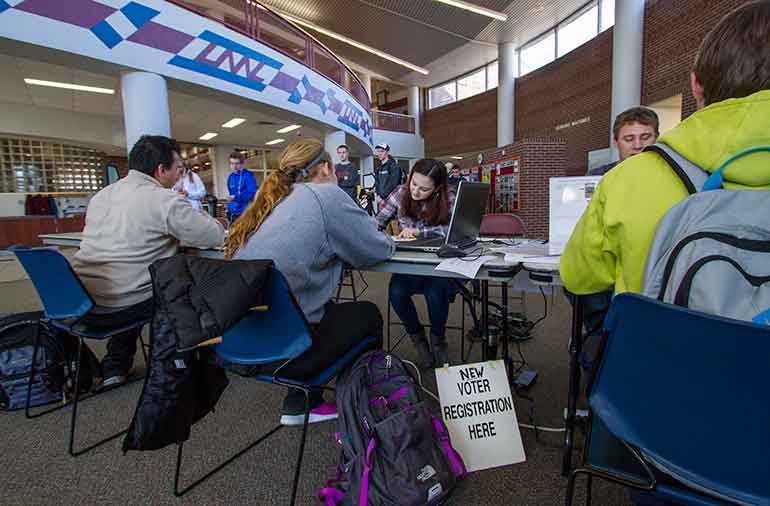 Students voting. 