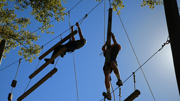 Image of students climbing.