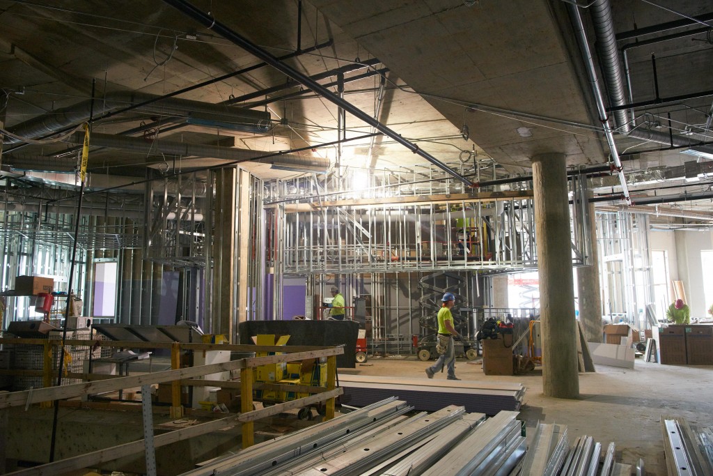 The main floor would mimic the convergence of the three rivers in La Crosse with three main entrances converging upon an information desk and central gathering place.