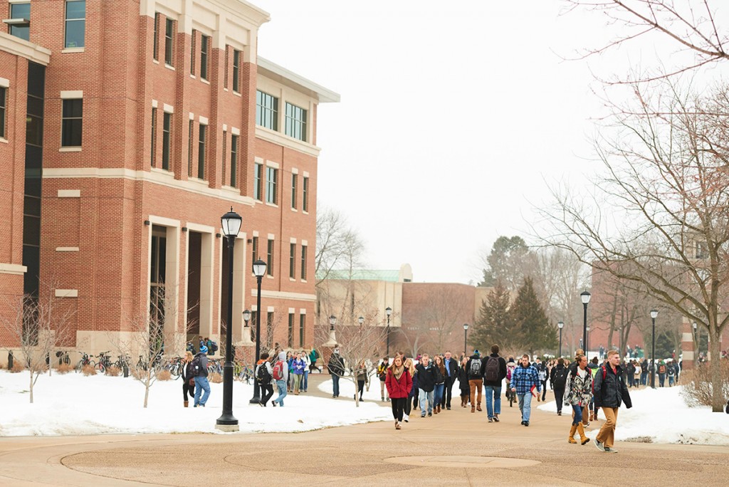 Activity; Walking; Buildings; Centennial; Clock Hoeschler Tower; Location; Outside; Time/Weather; cloudy; day; snowy; Type of Photography; Candid; UWL UW-L UW-La Crosse University of Wisconsin-La Crosse; Winter; January