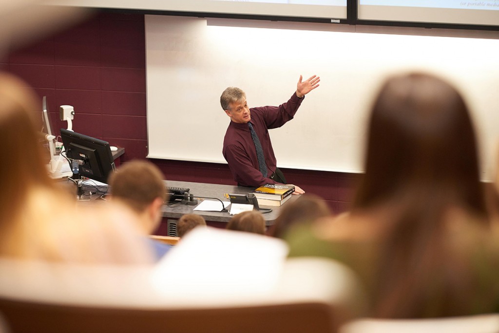 Buildings; Cowley; Activity; Speaking; Teaching; Location; Inside; Classroom; People; Faculty; Professor; Man Men; Type of Photography; Candid; UWL UW-L UW-La Crosse University of Wisconsin-La Crosse; Winter; January; Objects; Whiteboard Chalkboard; Computer; Lecture Hall; CURTIS CZERWINSKI