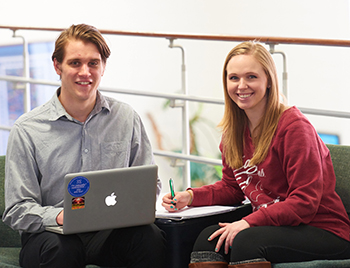 Image of Rachel Neve and Marcus Lowe sitting together.