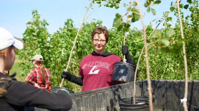 Biology Professor Meredith Thomsen works with students in the field.
Read more →