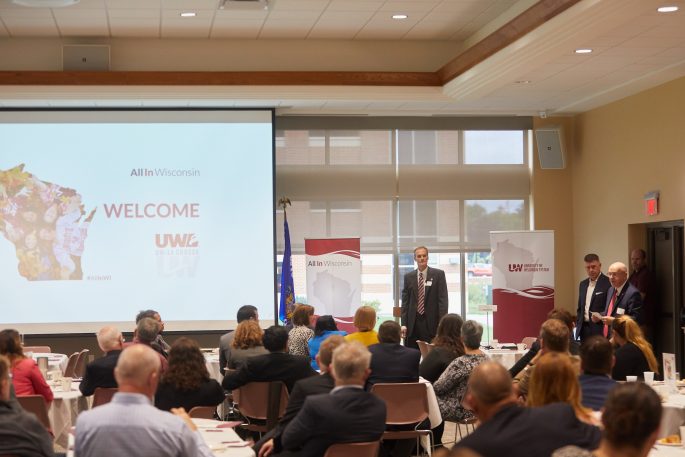 UWL Chancellor Joe Gow, left, and UW Board of Regents President Andrew S. Petersen and UW System President Ray Cross, far right, led the morning discussion of community business leaders during the All In Wisconsin tour stop at UWL Wednesday, Oct. 2.