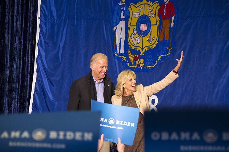 Joe and Jill Biden at podium. 