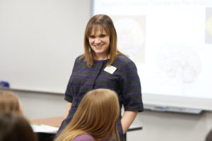 Boardman lectures in front of class