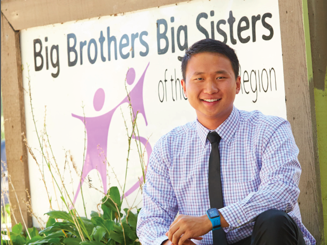 Chai Yang pictured by YMCA sign.