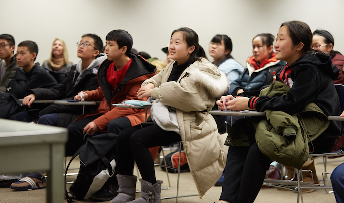 Image of Chinese middle school students sitting in a classroom.