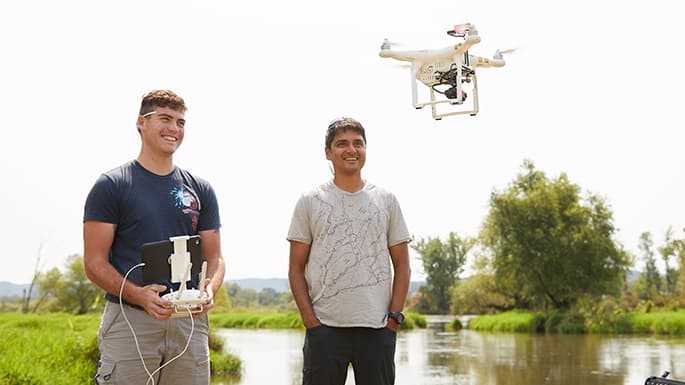 UWL student Zachary Woodcock, left, earned a summer research grant to use drones to conduct aerial surveys of purple loosestrife, an aquatic invasive plant with help from UWL faculty mentor and remote sensing scientist, Niti Mishra, right. Here Woodcock takes a drone survey test flight at the La Crosse River Delta near Bangor.
Read more →
