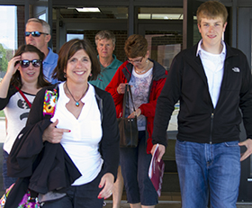 Image of parents and students walking out of Cartwright Center during 2013 Freshman Registration and Family Orientation.