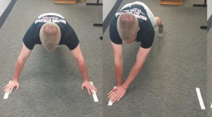 UWL students studied the validity of a test used by allied-healthcare providers to measure whether a patient’s upper body is rehabilitated. Here a student performs the test that involves being in plank position with hands 36 inches apart. Patients are instructed to touch the opposite piece of tape and count touches for 30 seconds. 