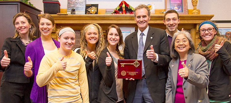 Image of Golden Key members posing with UW-L Chancellor Joe Gow.