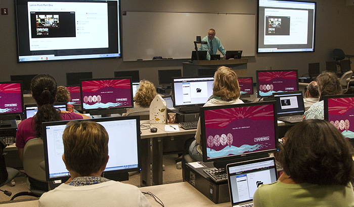 Terry Wirkus in front of class. 