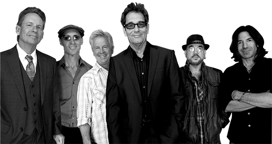 Image of band members in Huey Lewis and the News.