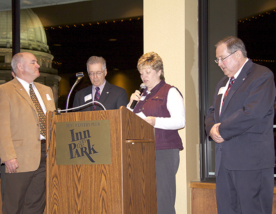 Awards were presented to Pat Stephens and Al Trapp during the event. From left, Stephens, director of collegiate gifts; Joe Heim, Political Science; Janie Spencer, executive director of the UW-L Alumni Association; Trapp, president of the UW-L Foundation.