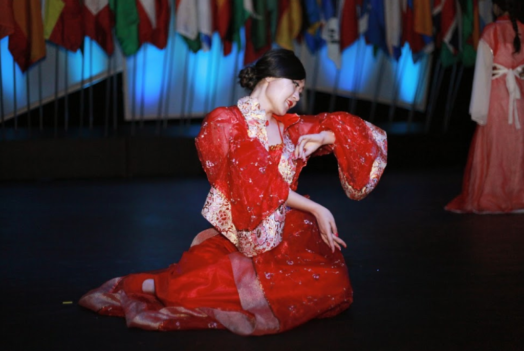 UW-L international student Xinyue Zheng holding a dance pose.