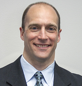 Headshot image of Josh Whitman.