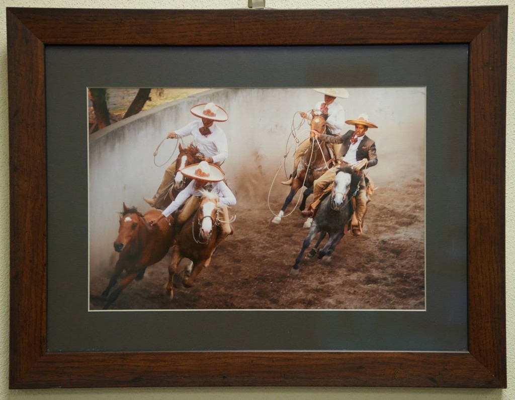 Original image by Lee Baines. Cowboys riding on horseback.