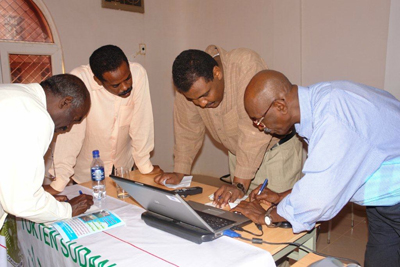 Mohamed Elhindi, UW-L chief information officer, with a group of deans from colleges in Sudan.