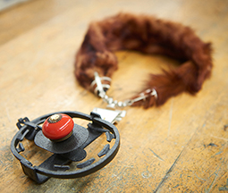 Mink necklace with a live trap as a pendant by Mark Nichols