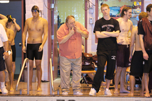 Photo of Rich Pein with swimmers.