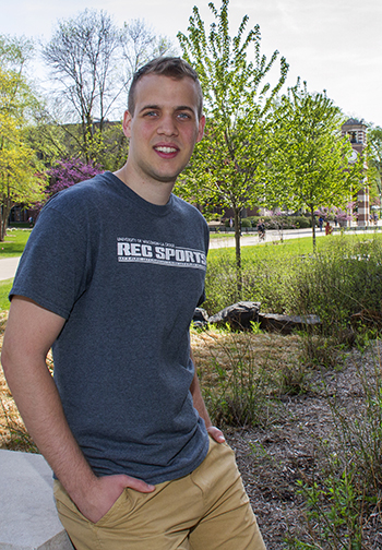 Image of Peter Molnar with Hoeschler Tower in the background. 