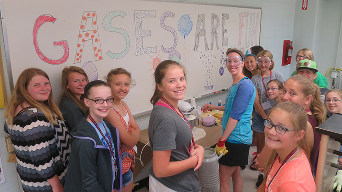 “Feelin’ Gassy?” Girls explore various types of gasses and their uses…including making ice cream in Tanya Corde’s workshop.