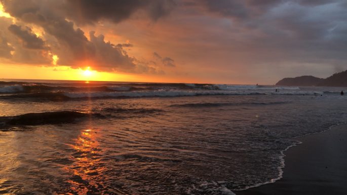 UWL student Savannah Stanley returned to Playa Jaco on the Pacific coast multiple times throughout her stay in Costa Rica to see the beautiful sunsets. This photo was taken after her first surfing lesson.