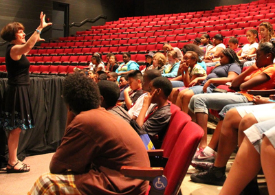 Mary Leonard, UW-L associate professor in the Department of Theatre Arts, talks to students about acting.