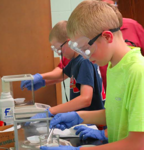 Students investigate light and matter in Kendric Nelson’s Chemistry workshop