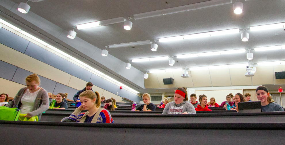 students in a UW-L lecture hall in Centennial Hall. 