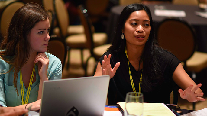 UWL senior Emily Sherwin, left, pictured during discussions at the Beta Gamma Sigma Global Leadership Summit. Sherwin says the experience helped prepare her for successful collaboration that she expects in a future career. Photo courtesy of Glennon Williams.