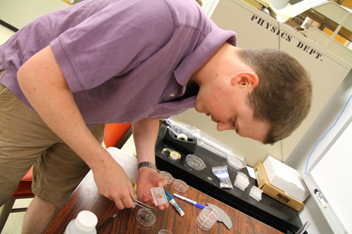 UW-L Assistant Professor of Physics Seth King mounts a sample to be analyzed by x-ray diffraction.