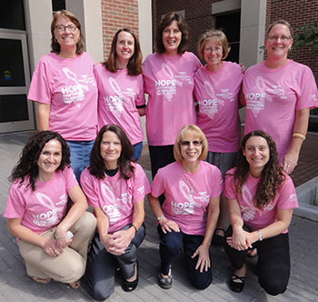 Group shot with women in pink T-shirts. 