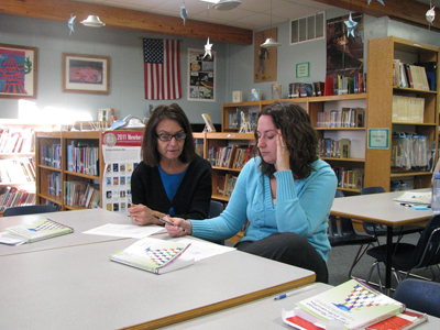 Two Stoddard Elementary School staff members discuss how they might apply Response to Intervention strategies to their work with students.