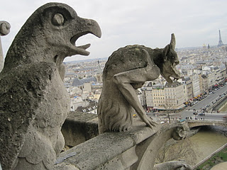 These gargoyles are at the base of the roof of the Notre Dame Cathedral in Paris.