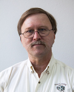 Headshot image of Thomas Greiner