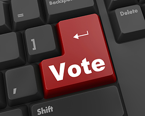 Image of a keyboard with a key with the word "vote" on it.